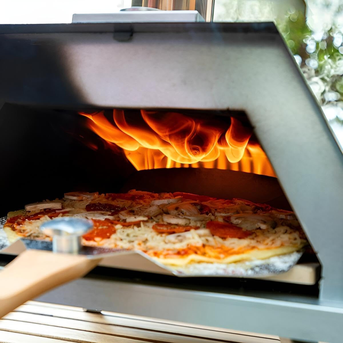 Pizzaofen Outdoor für Tisch und Co. | Garten-Ofen Edelstahl für Holz-Pellets, Holzkohle oder Holzscheite | Bis 500 ºC | Spatel, Stein, Tasche inklusive