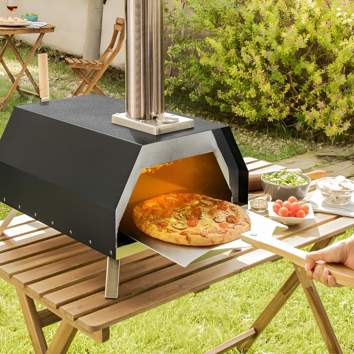 Pizzaofen Outdoor für Tisch und Co. | Garten-Ofen Edelstahl für Holz-Pellets, Holzkohle oder Holzscheite | Bis 500 ºC | Spatel, Stein, Tasche inklusive